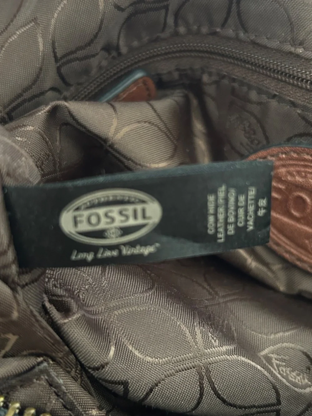 Fossil maddox leather